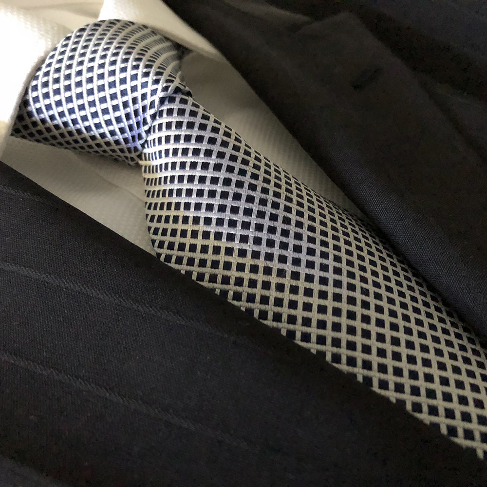 “DISTINGUISHED GENT” SEVEN FOLD SILK NECK TIE